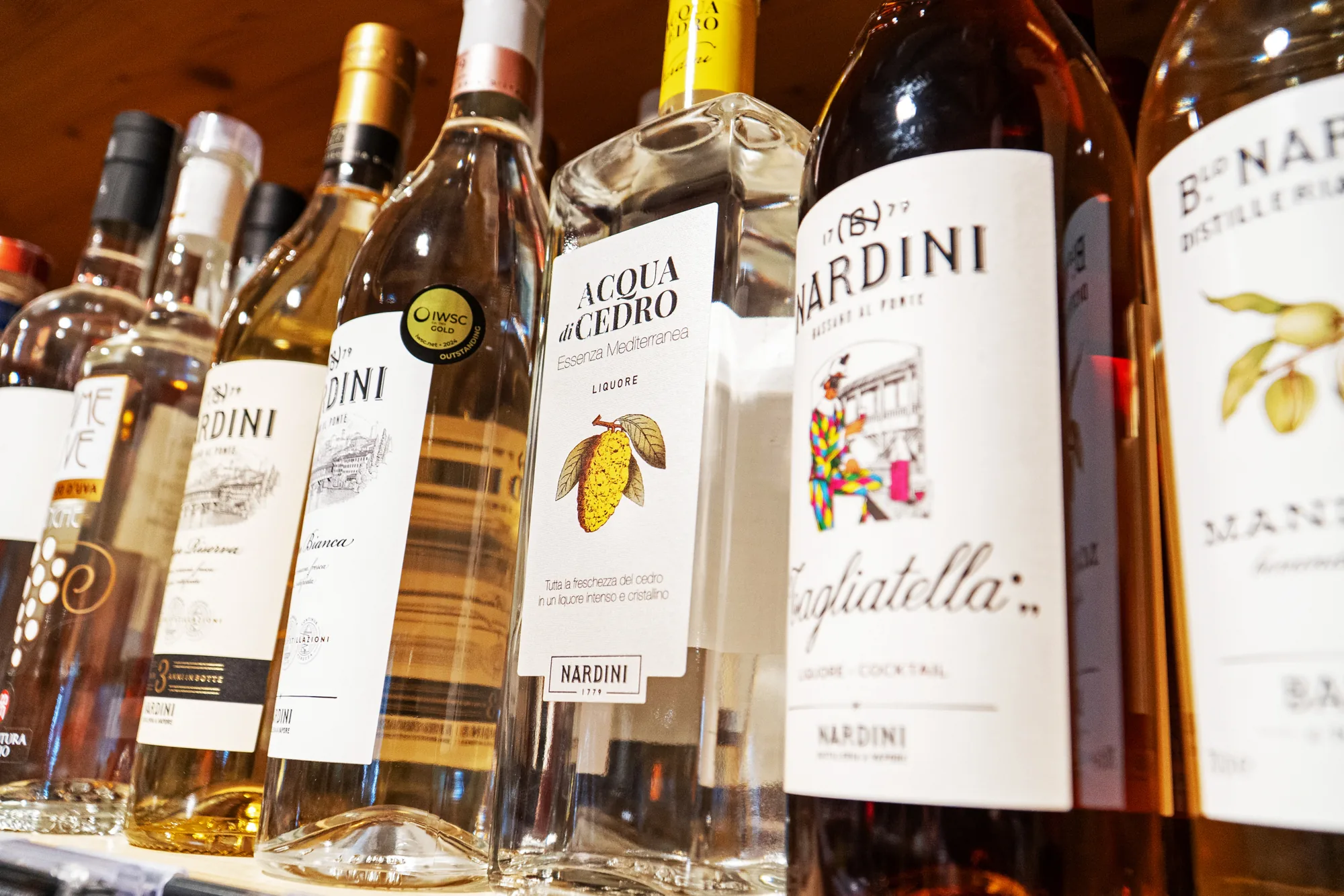Grappa and herbal spirits on the spirits shelf