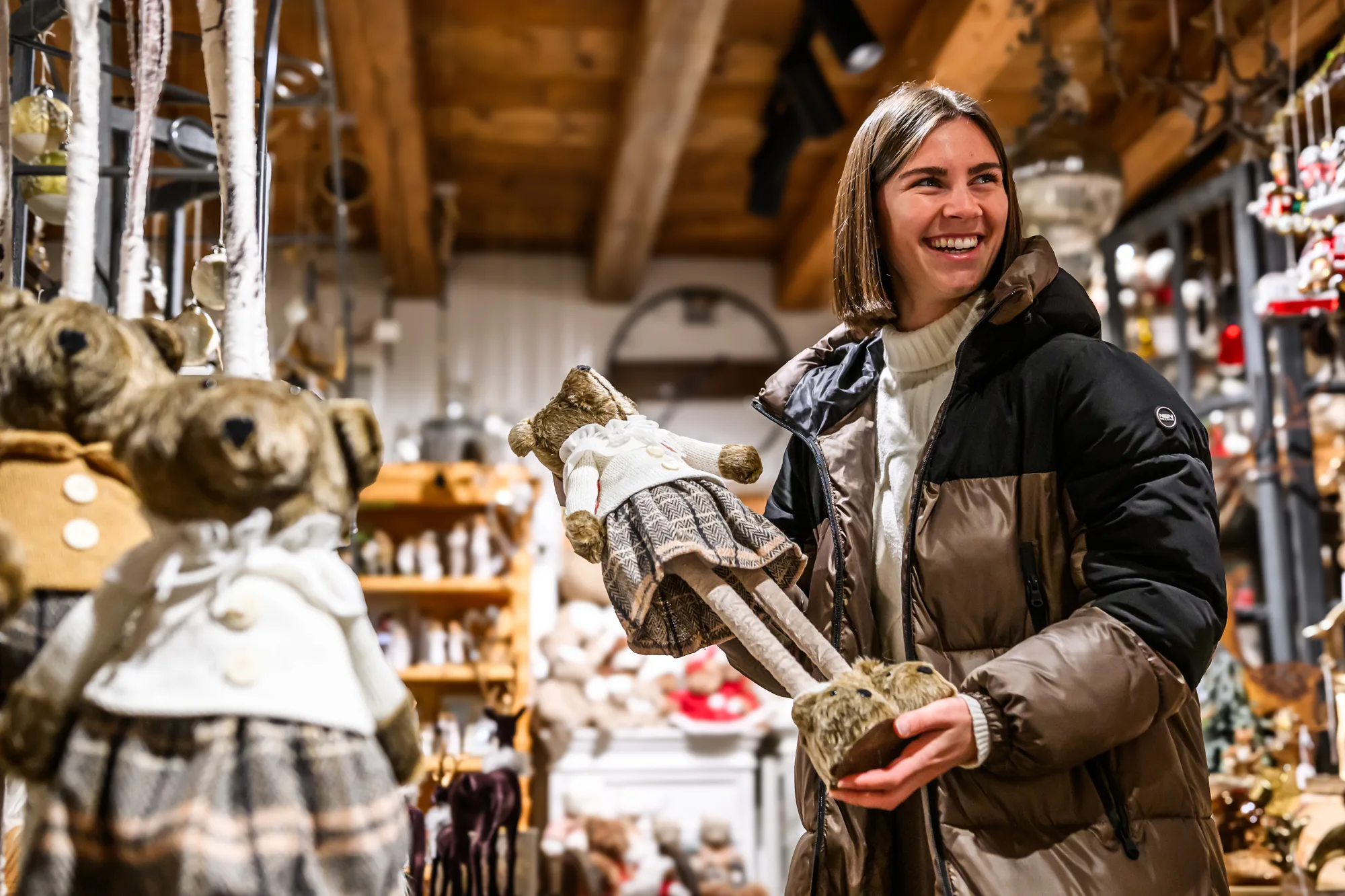 Customers browsing handmade decorations in Val Gardena